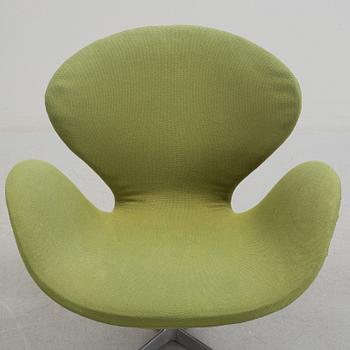A Arne Jacobsen "Svanen" armchair and stool, second half of the 20th century.