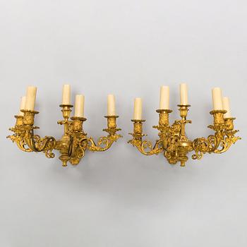 A pair of Empire wall candelabras in gilt bronze from first half of the 19th century.