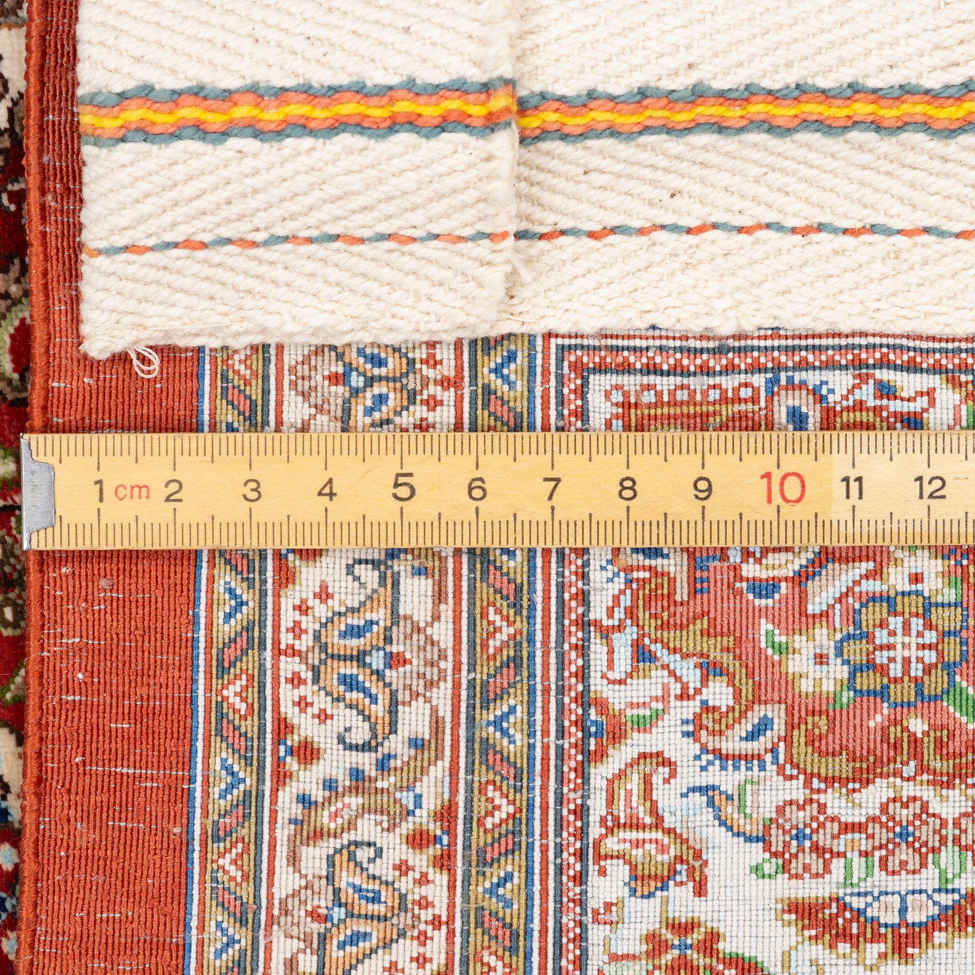 A silk Qum, Central Persia, signed Jashmedi c. 141 x 103 cm.
