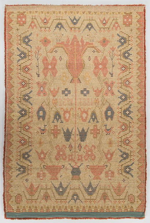 A Finnish folkart ryijy-rug dated 1825-1952. Circa 195 x 130 cm.