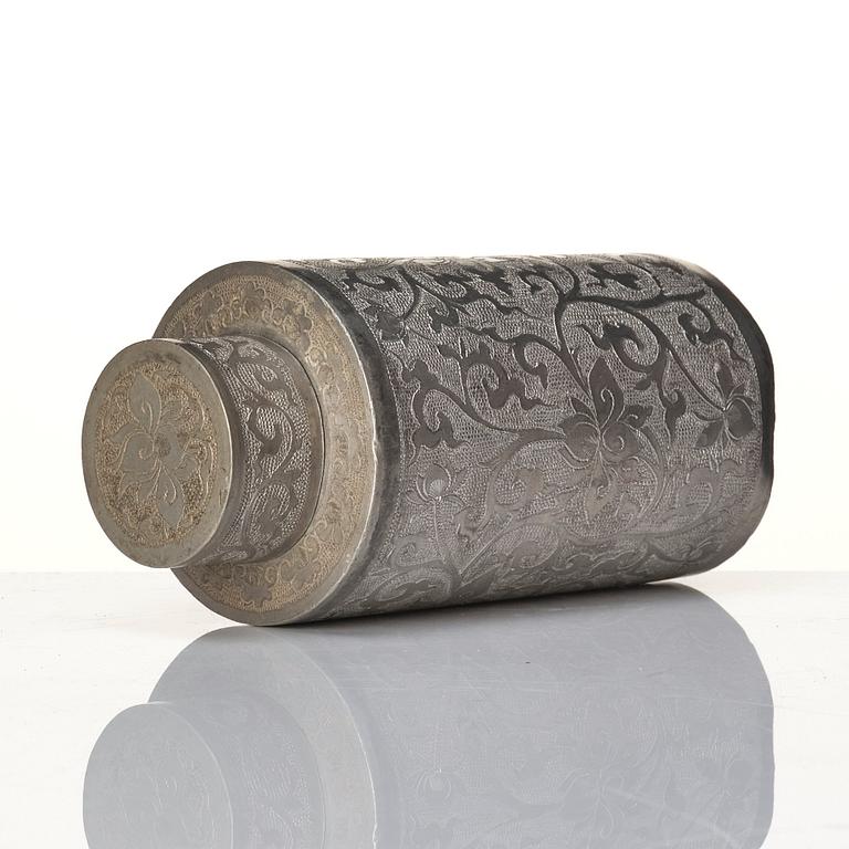 A Chinese lacquer box with a set of five pewter tea caddies, Qing dynasty, 18/19th Century.