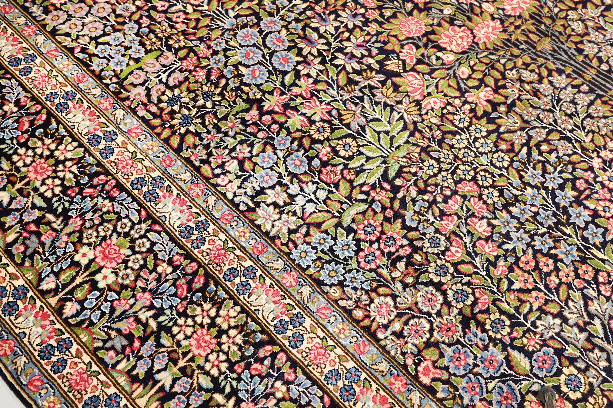 A Kerman Laver carpet, 'Millefleur', approx. 388 x 300 cm.