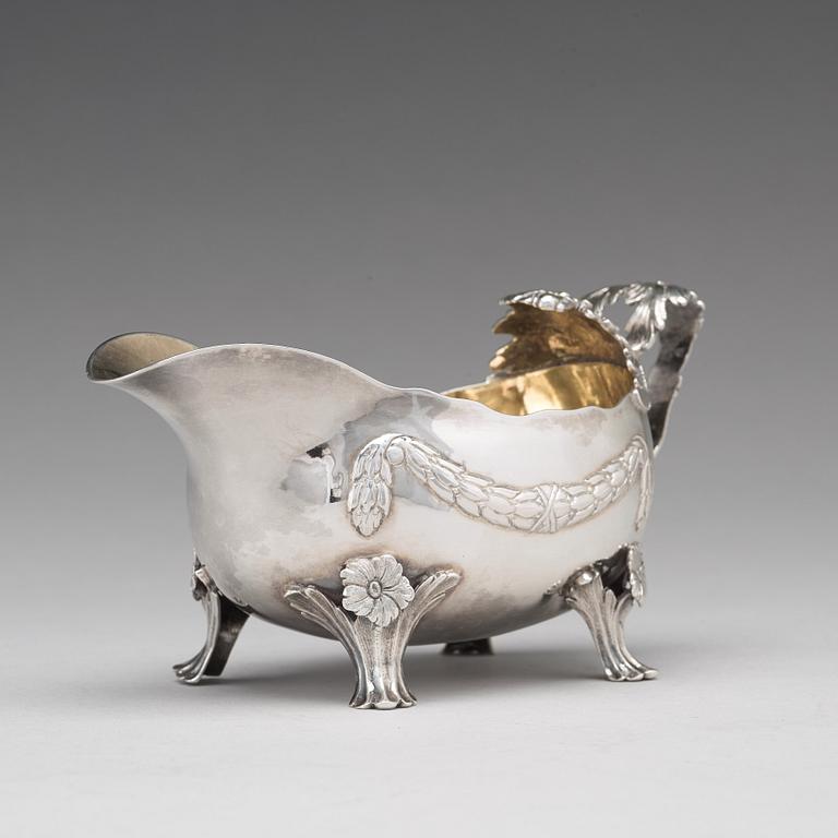 A Swedish 18th century parcel-gilt silver cream-jug, marks of Lars Boye Stockholm 1772.