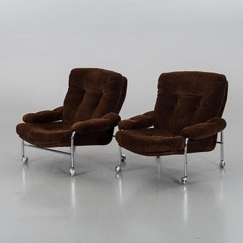 TWO 1970`S ARMCHAIRS.