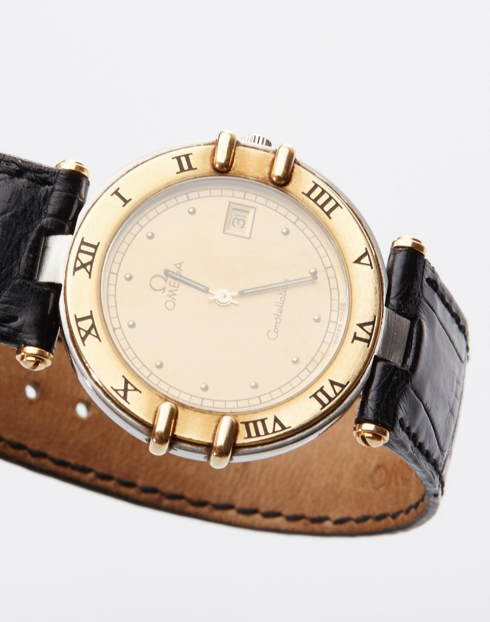 ARMBANDSUR. Omega Constellation, guld och stål. 1990-tal.