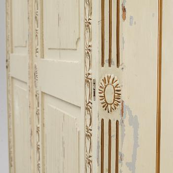 A late Gustavian cabinet, early 19th century.