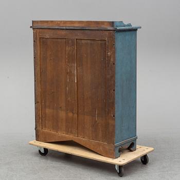 A mid 19th century painted cupboard.