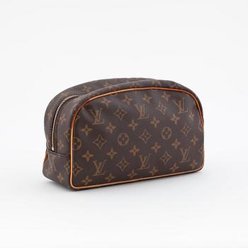 LOUIS VUITTON, a monogram canvas toiletry case.