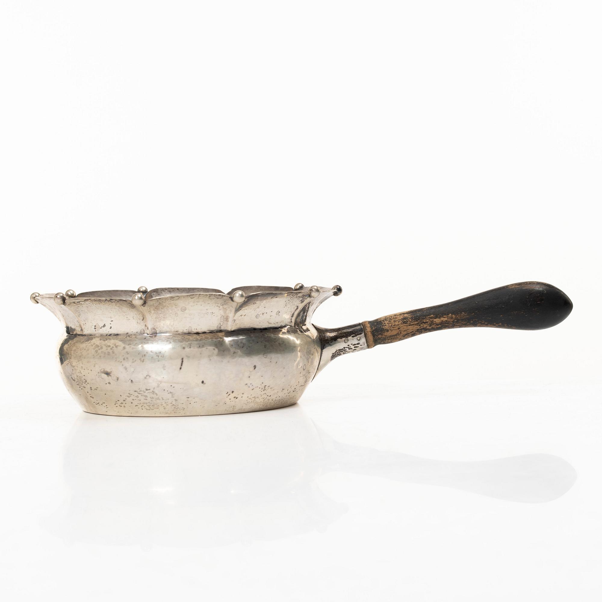 Sauceboat, silver, Oscar Sjögren, Gothenburg 1920, and spoon, silver, David Andersen, Norway early 20th century.