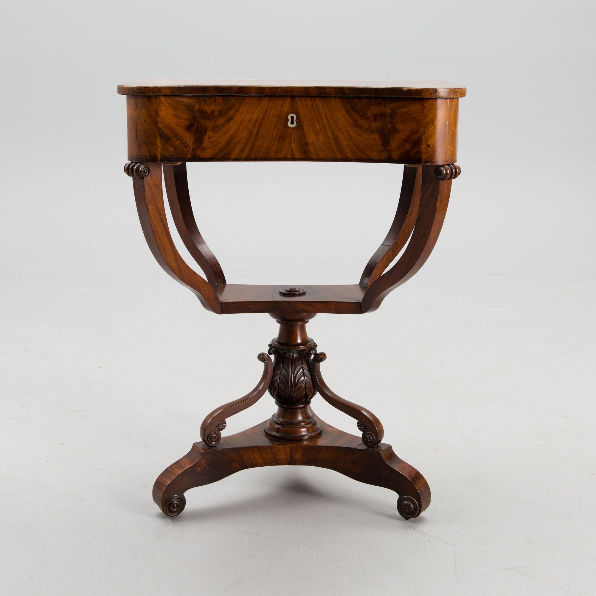A sewing table from the first half of the 19th century.