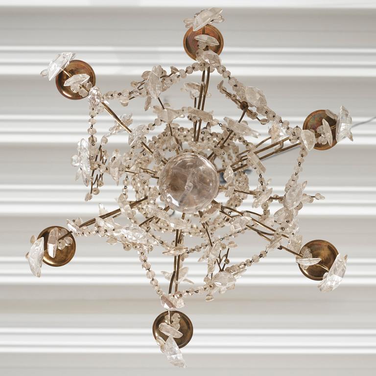 A presumably Italian Baroque and Baroque-style rock crystal and cut-glass six-branch chandelier, 18th century and later.