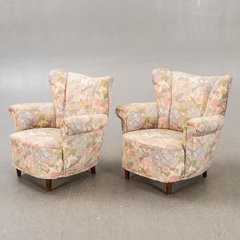 A pair of 1940s easy chairs.