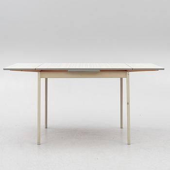 A table and four chairs, mid-20th Century.