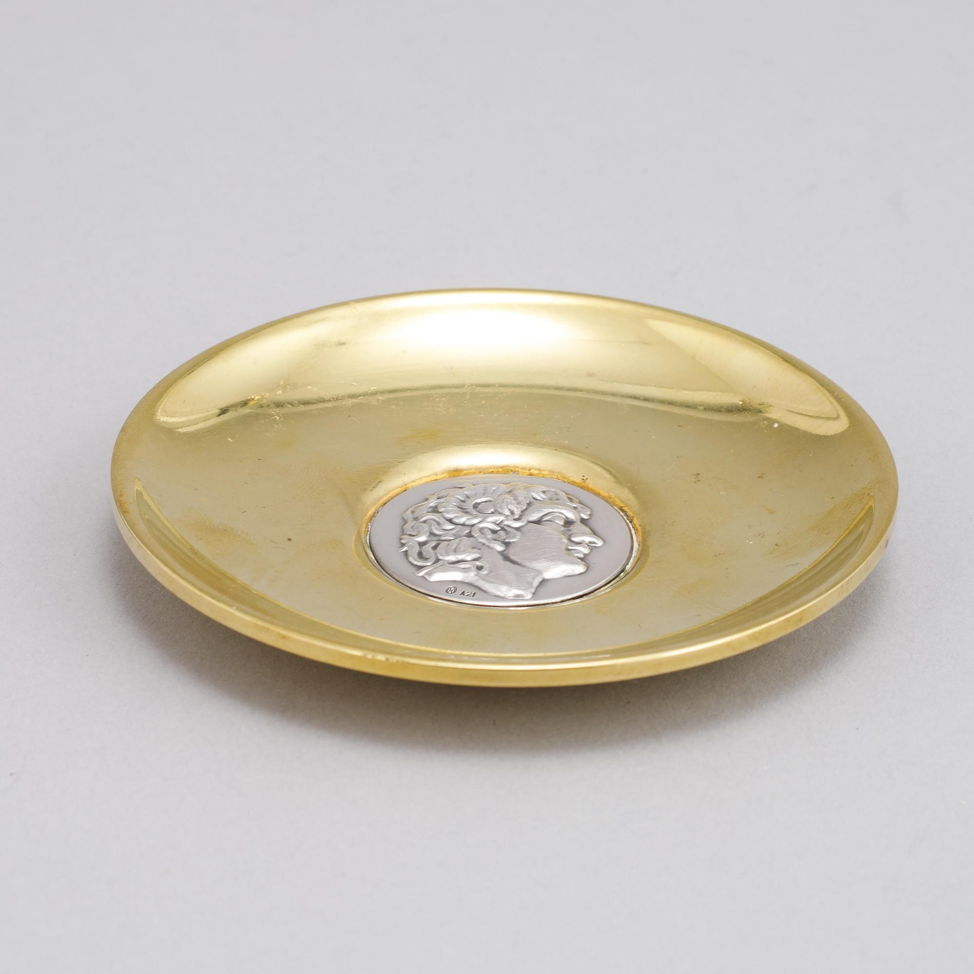 Five silver plates by Ilias Lalagounis, Greece.