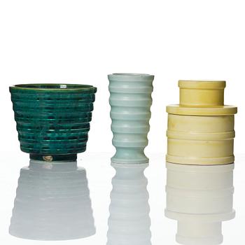 Wilhelm Kåge, A set of three ceramic flower pots, a vase and jar with lid,  Gustavsberg 1930s.