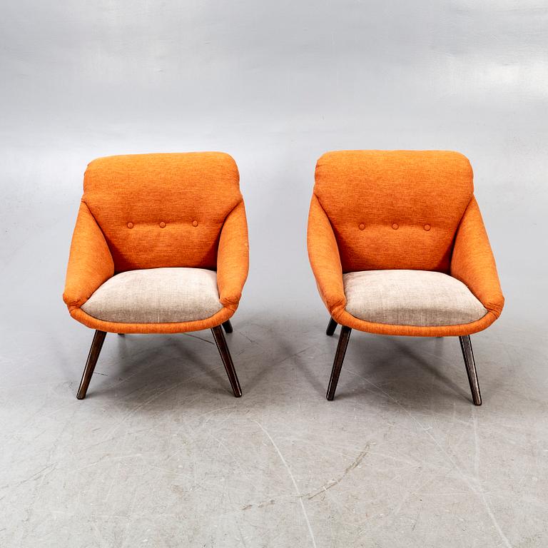 A pair of 1950s easy chairs.