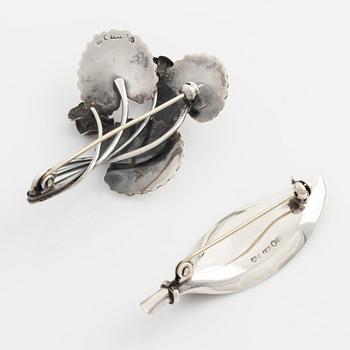 Arvo Saarela, two silver brooches.