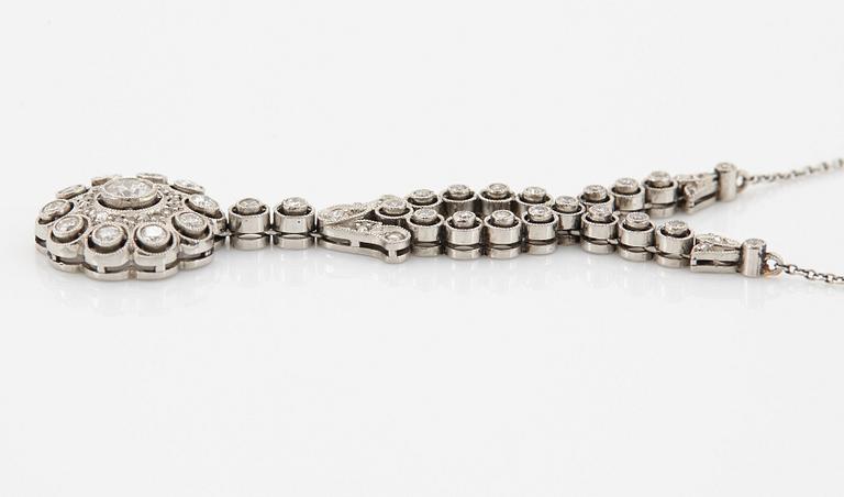 A platinum bracelet set with old- and rose-cut diamonds.