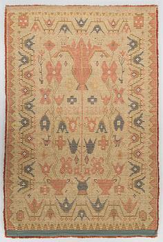 A Finnish folkart ryijy-rug dated 1825-1952. Circa 195 x 130 cm.