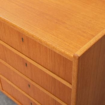 A second half of the 20th century teak veneered sideboard.