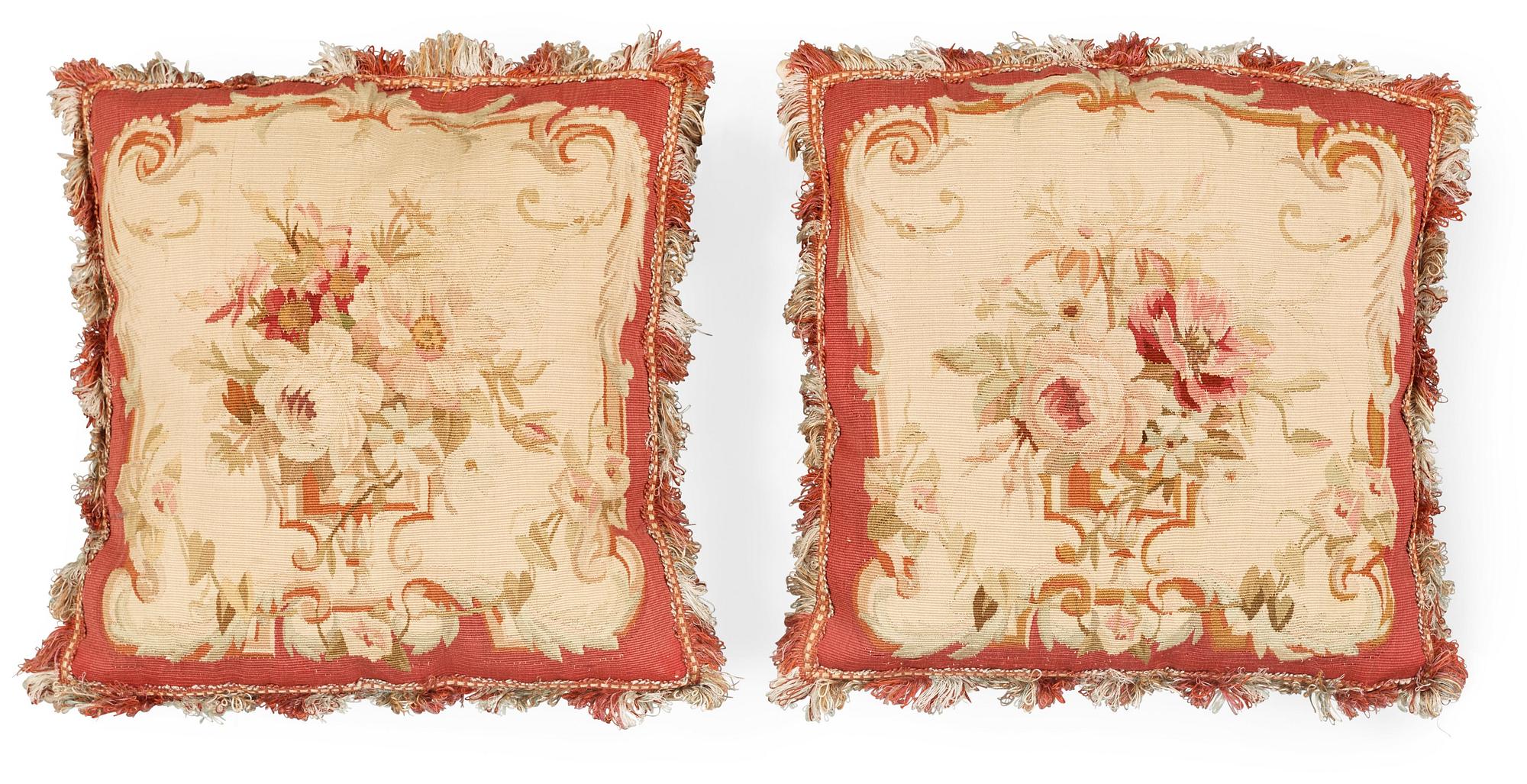 CUSHIONS, 1 pair, Tapestry weave, Around 40 x 38,5 cm each, Aubusson, France, 19th century, a Royal provenance.