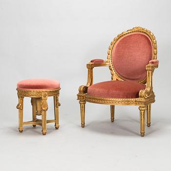 Armchair and stool, Louis XVI style, circa 1900.