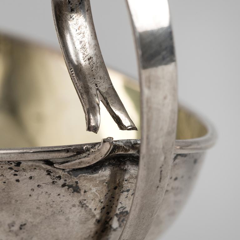 A pair of firt half of the 19th century parcel-gilt silver salt-cellars by an uknown master, one marked HB.