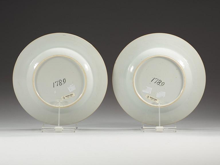 A pair of famille rose dinner plates, Qing dynasty, Qianlong (1736-95), dated 1789.