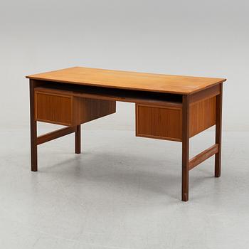 A 1960's teak writing desk.