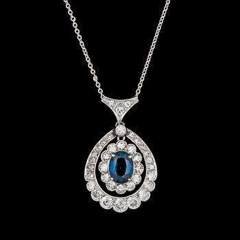 71. A blue sapphire and diamond pendant, tot. app. 0.90 cts, c. 1925.