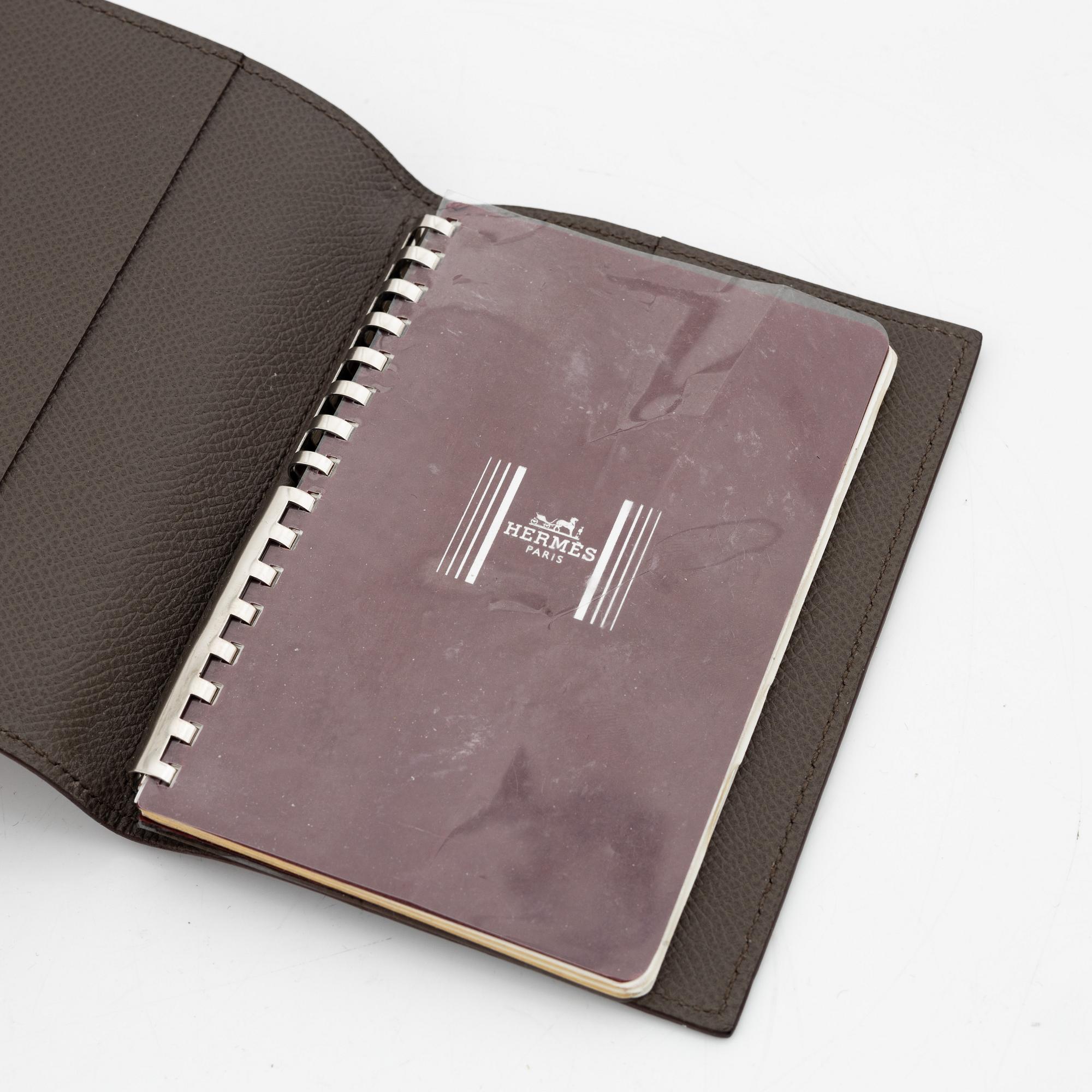 Hermès, notebook with leather case.