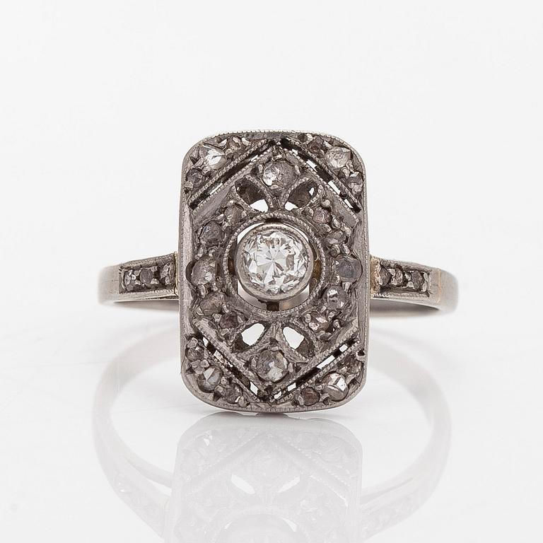 A platinum art deco ring with old-cut and rose-cut diamonds, Moscow, first half of the 20th century.