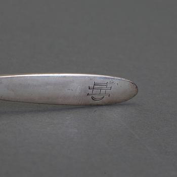 A set of 12+6 spoons by Georg Jensen,