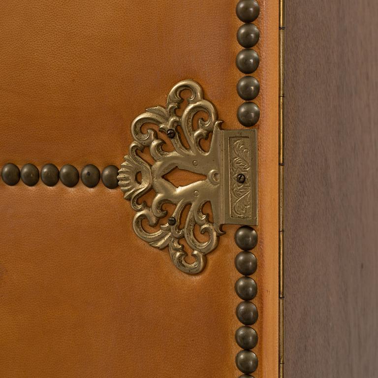 A leather, oak and mahogany cabinet, mid 20th Century.