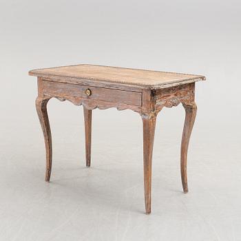 An 18th century rococo table.