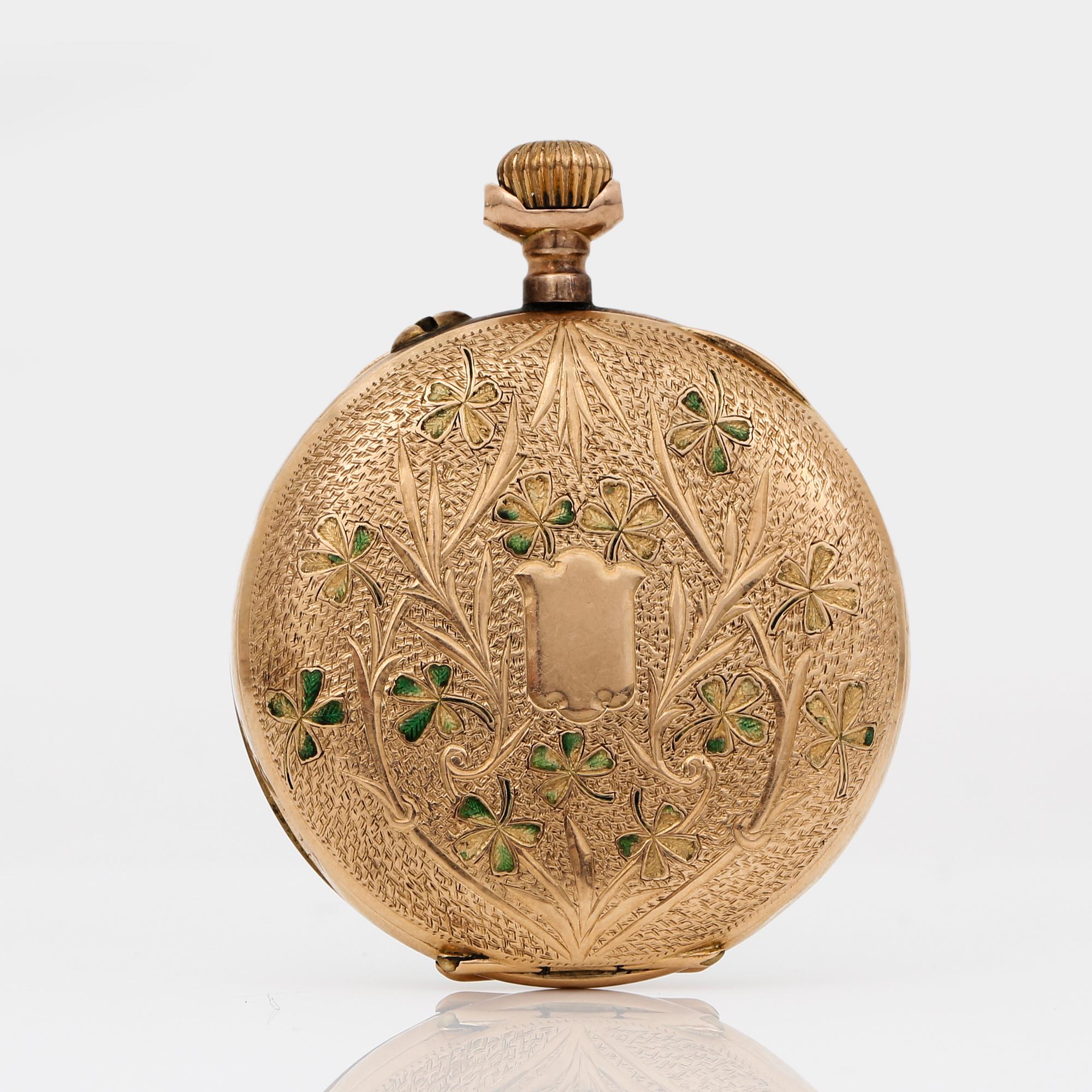 FICKUR, 14K guld, gul metall och emalj, Schweiz, omkring sekelskiftet 1900-tal.