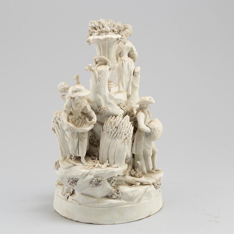 A porcelain figurine group circa 1900.