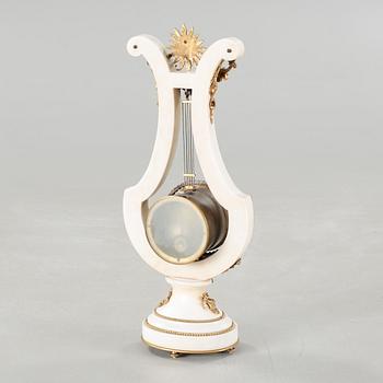 A table clock, dial marked "Gilles l'Ainé Paris", made around year 1900.