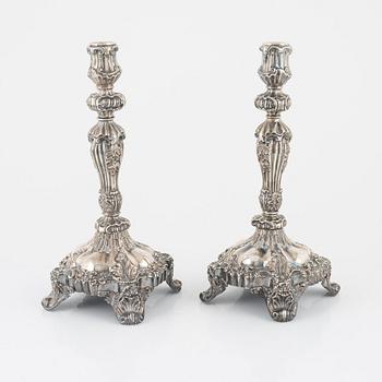 A pair of silver candlesticks by Gustav Möllenborg, Stockholm 1848.