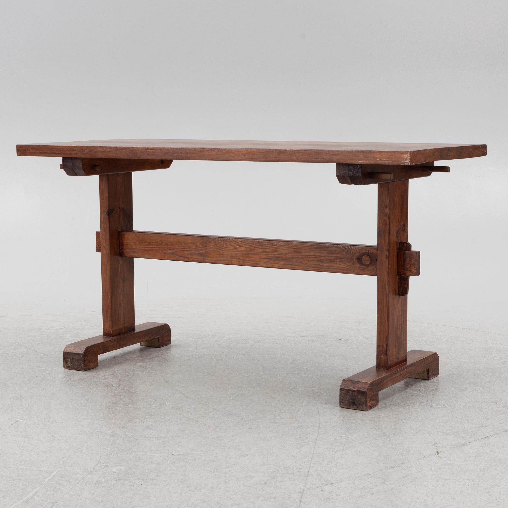 Carl Malmsten, A stained pine table, 20th century.