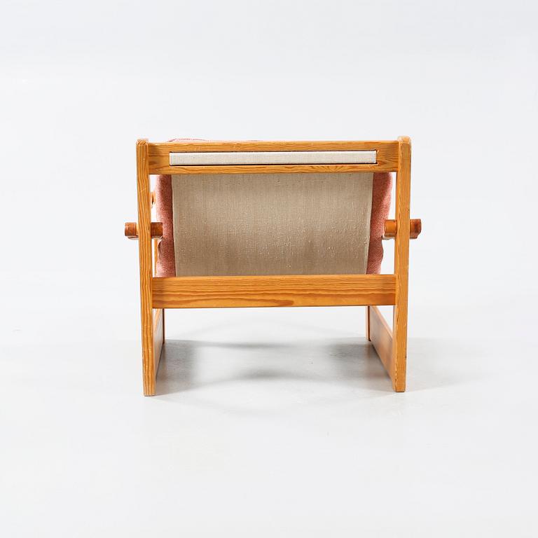 An easy chair with footrest, model "Remo", designed by Yngve Ekström for Swedese Möbler AB 1970.