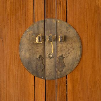 A Chinese hardwood cabinet, 20th century.