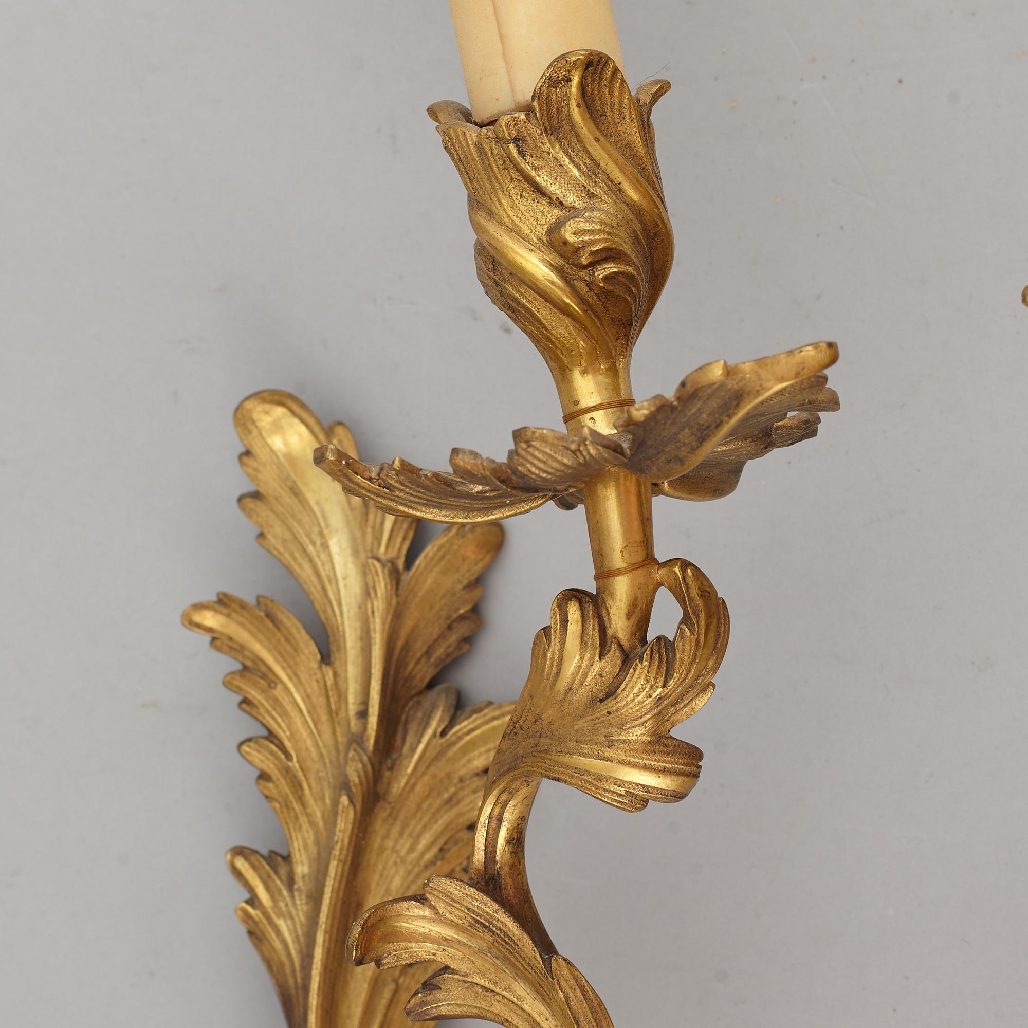 APPLIQUER, för ett ljus, ett par, mässing, Louis XV-stil 1900-tal.