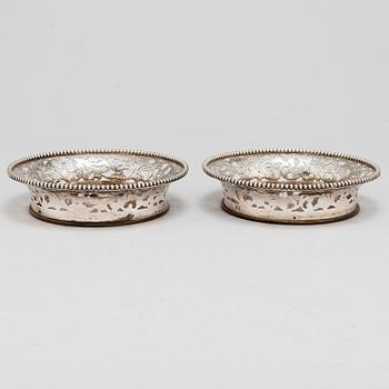 A pair of sterling silver coasters, late 20th Centrury.