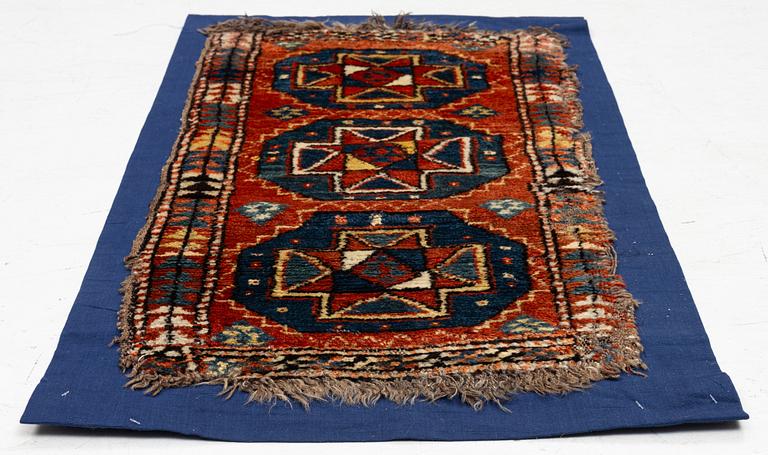 An antique Yastik rug, possibly Afghanistan, c. 110 x 57.