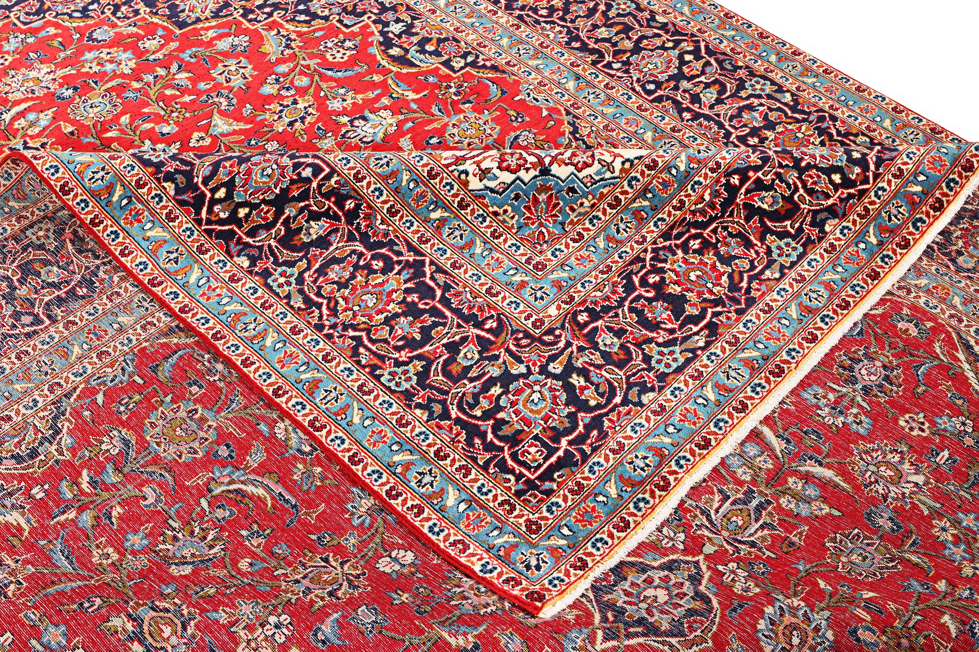A Kashan carpet, c. 403 x 292 cm.
