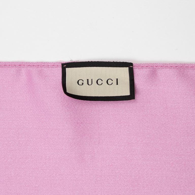 Gucci, a wool and silk mix "GG" jaquard shawl.