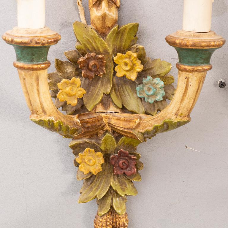 A pair mid 20th century wooden wall lamps from Paoletti, Firenze Italy.