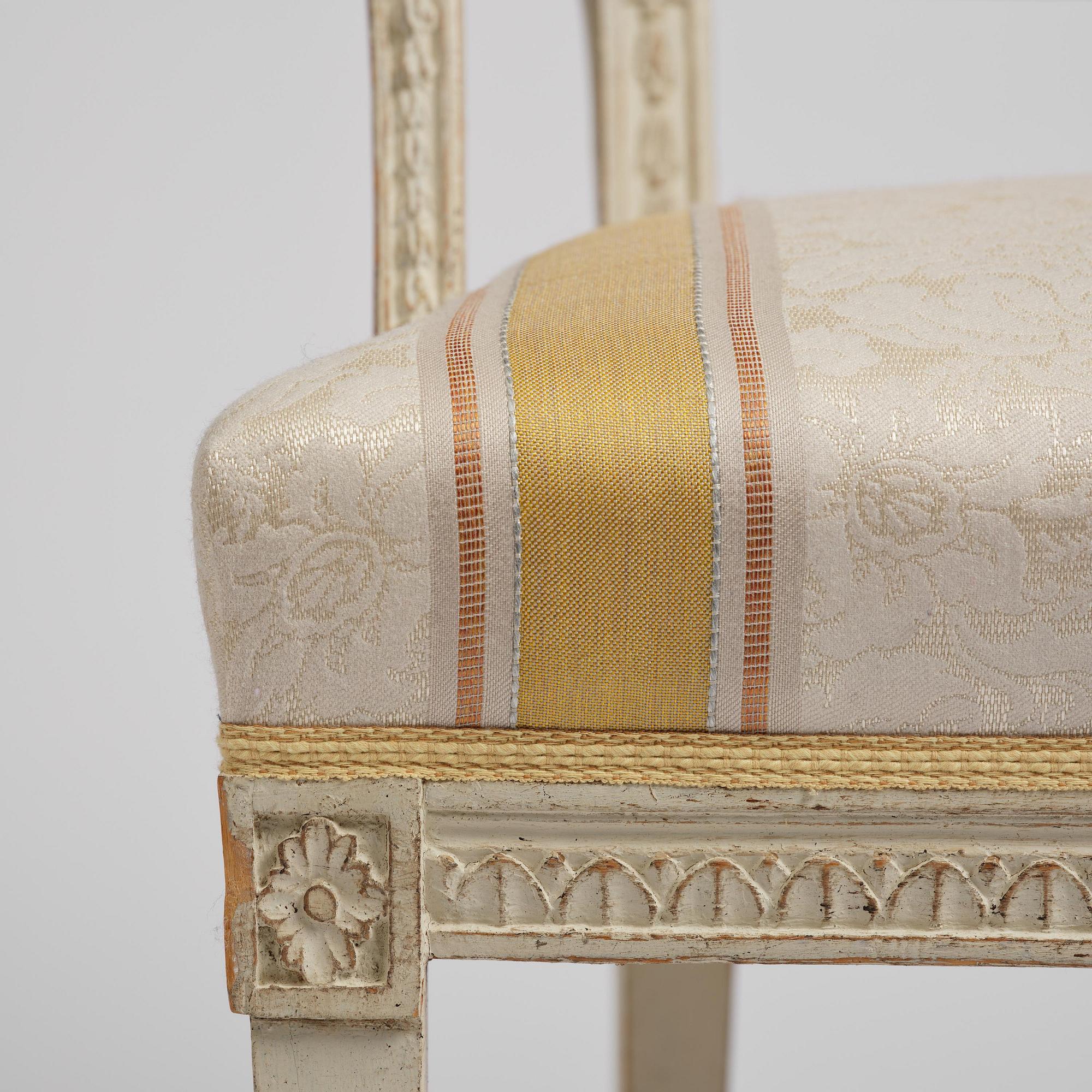 A matched pair of late Gustavian armchairs.