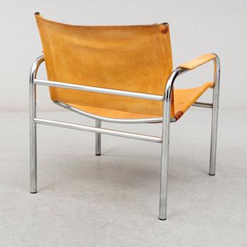 TORD BJÖRKLUND, a 'Klinte' leather and tubular steel easy chair from IKEA, 1970's.